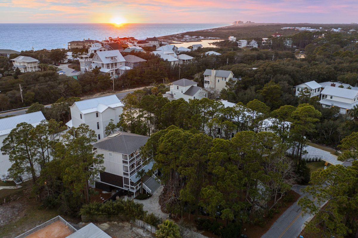 sunset over coastal neighborhood